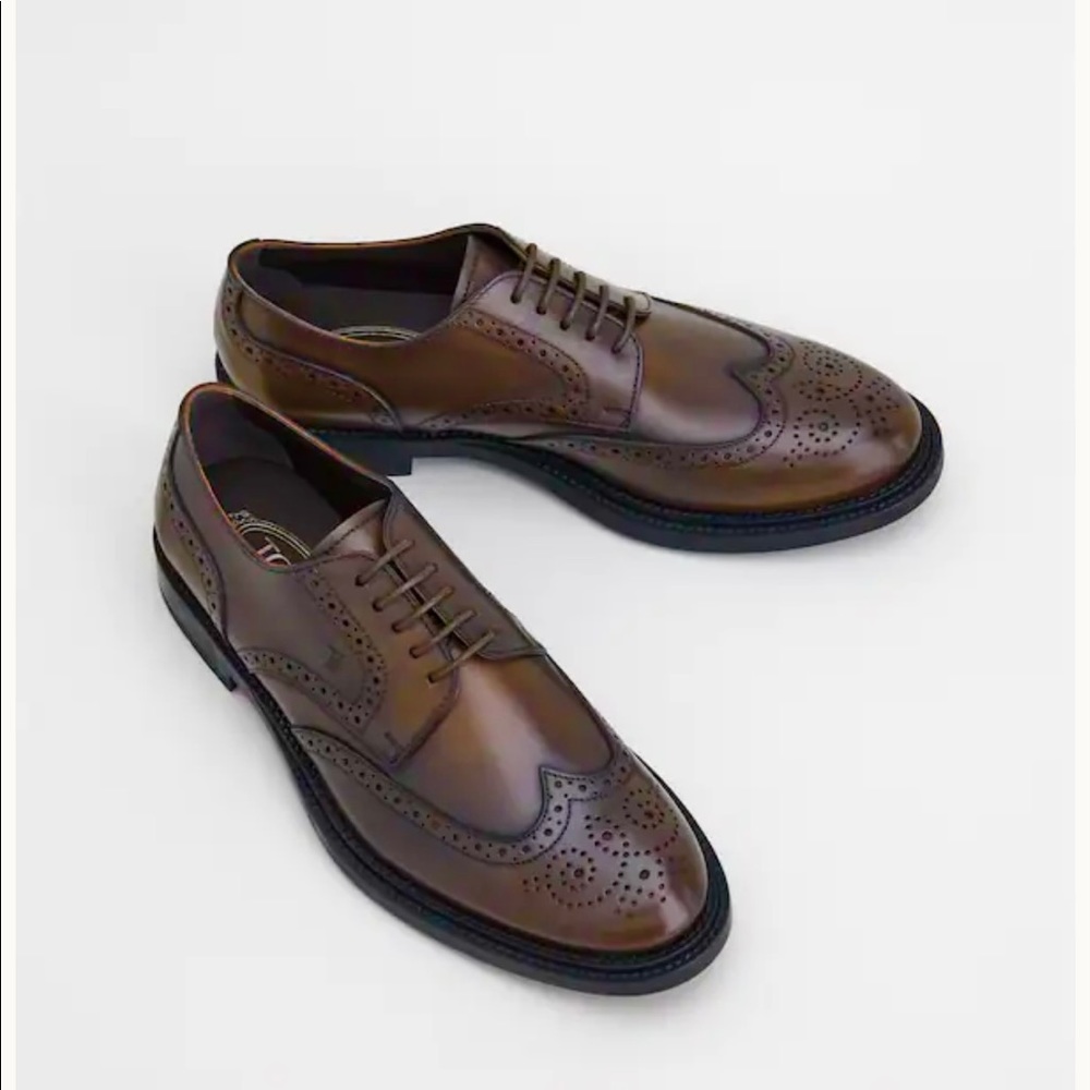 Tod’s lace up boots in leather - brown